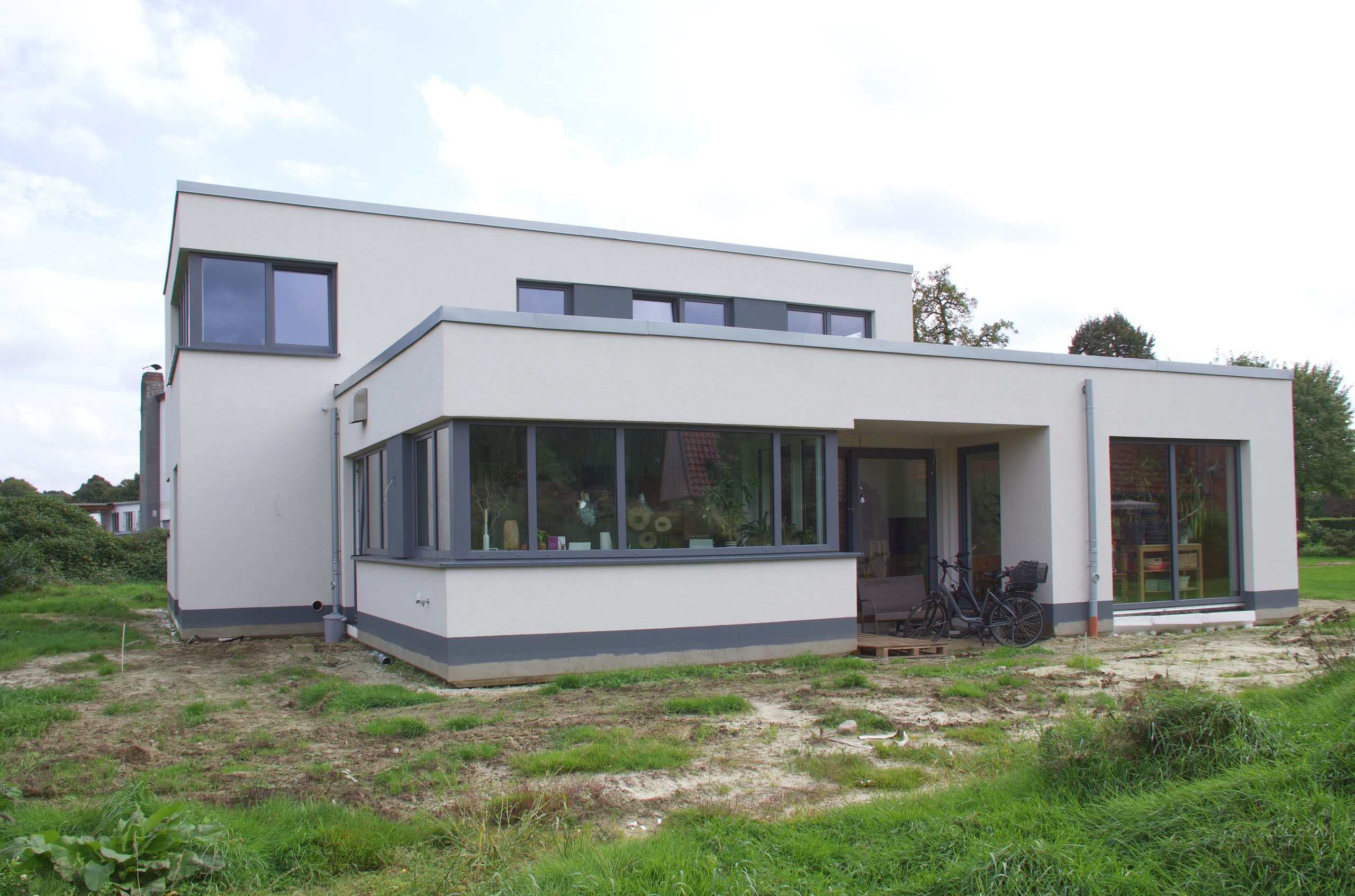 Einfamilienhaus WDVS-Fassade mit Flachdach Sulingen