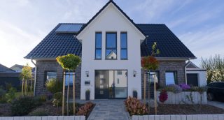 Einfamilienhaus Klinker / WDVS - Mischfassade mit Satteldach